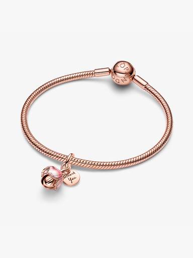 Openable flower 14k rose gold-plated dangle with royal green crystal and glittery shaded pink UV resin