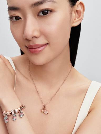 Firefly 14k rose gold-plated dangle with yellow photoluminescent glass