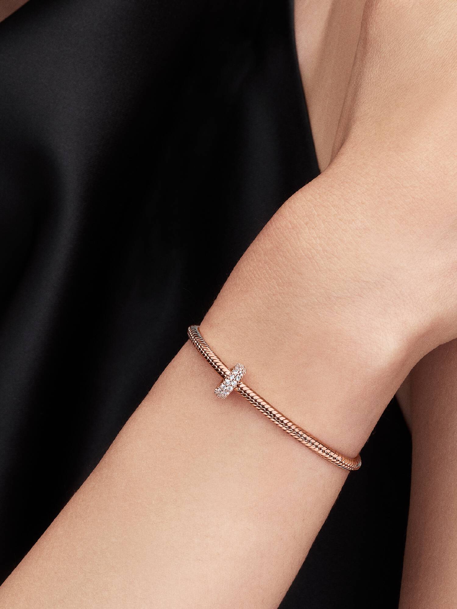 Abstract 14k rose gold-plated spacer with clear cubic zirconia