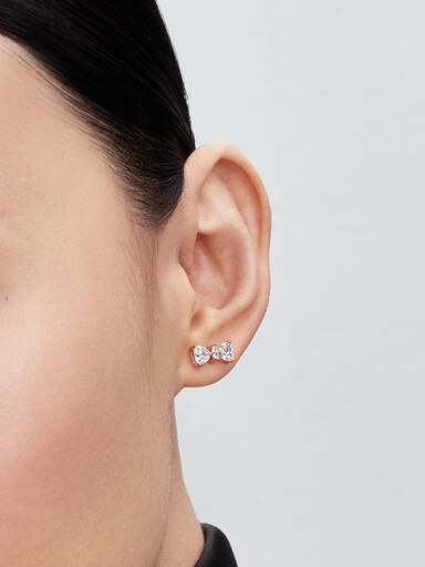 Bow 14k rose gold-plated stud earrings with clear cubic zirconia