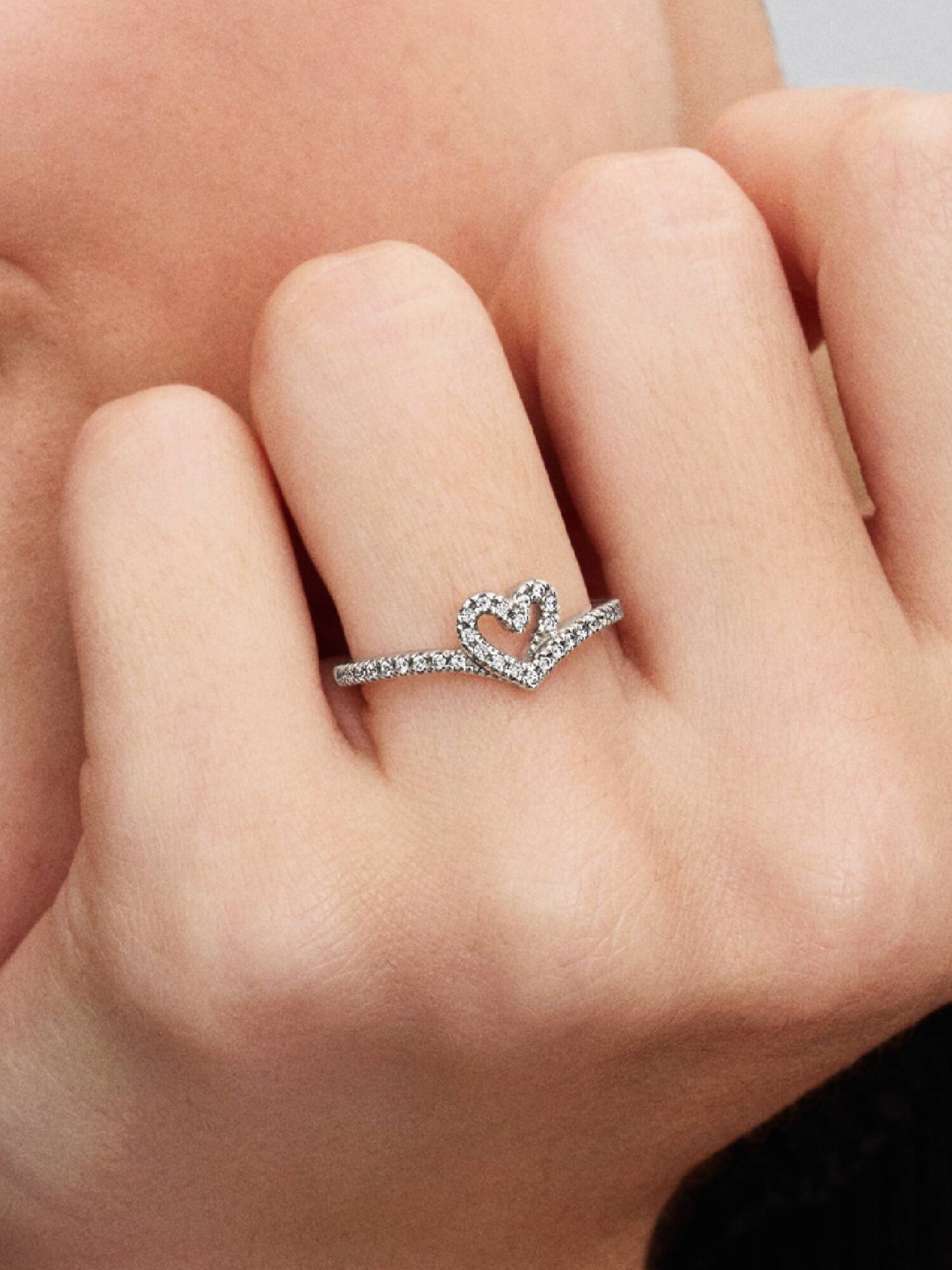 Heart and wishbone sterling silver ring with clear cubic zirconia